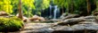 © Marina - mossy rock surface with blurred waterfall in rainforest background