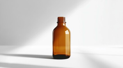 Poster - Empty amber glass bottle on white background in studio
