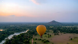 Yellow Hot Air Balloon Sunrise Over Sri Lankan Landscape