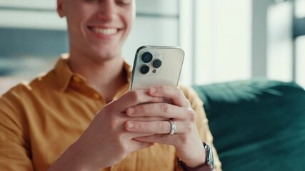 Happy, sofa and man with phone in home for social media, reading message and chatting. Living room, laugh and person on smartphone for communication, internet joke and online meme on mobile app