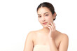 © kitthanes  - A beautiful young Asian woman with clean, fresh skin against a white background. Skincare, facial treatment, cosmetology, beauty, and spa. An elegant portrait of an Asian woman.