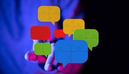 Aufkleber - Abstract image of colorful puzzle pieces shaped as speech bubbles, symbolizing communication and collaboration.