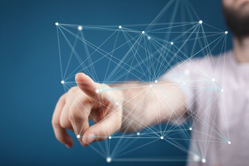 Leinwandbilder - Hand interacting with a digital network.  Modern technology, connection, and global communication.