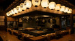 © RAJA - Cozy Izakaya Interior with Hanging Lanterns and Delicious Culinary Creations