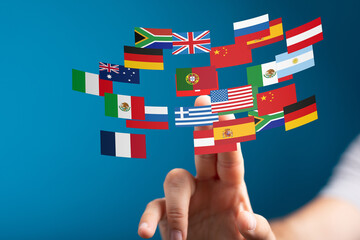 Aufkleber - Diverse flags represent global reach, international business, and world trade. Perfect for business, travel, or global concepts.