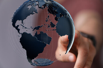Poster - Person's hand interacts with a digital 3D globe, representing global connectivity and networking.