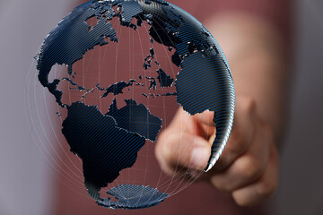 Fototapete - High-quality stock photo of a hand interacting with a digital 3D globe, representing global connectivity.