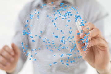 Fototapete - Person interacts with a digital globe, showcasing global connectivity and networking.