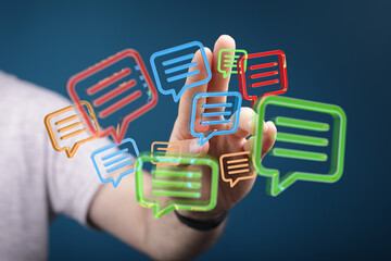 Poster - Abstract image of a hand interacting with colorful message bubbles, representing communication, social media, and online messaging.