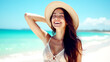© Ada - Stylish casual woman wearing a straw hat enjoying sun at tropical beach, , She is looking upwards with her eyes closed and a wide, joyful smile