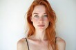 © miss irine - Close-up portrait of stunning woman with vibrant ginger hair blue eyes. Confident gaze, pale skin, freckles, natural beauty, positive emotions, health. Young redhead beauty on white background,
