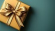 © Sathiya - Elegant Gold Gift Box with Ribbon on Calm Teal Background