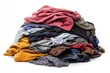 © All STAR - Pile of unsorted clothes messy laundry on white background