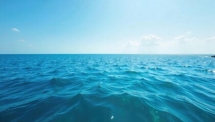 Wall Mural - Vast, unbroken expanse of ocean stretching to the horizon under a clear sky Perfect for travel, nature, and serenity themes Calming and majestic seascape , beautiful, clear sky