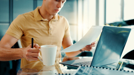 Aufkleber - Laptop, documents and man with coffee in office with finance proposal for investment planning. Cappuccino, computer and male financial advisor with paperwork for company budget report in workplace.