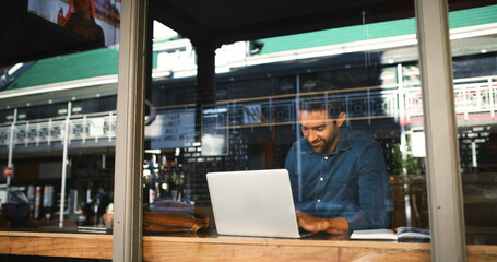 Aufkleber - Coffee shop, laptop and businessman by window in cafe for typing report, proposal and research. Restaurant, freelance and person on computer for internet, online project and review for remote work