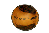 A traditional African hand-carved wooden bowl from Victoria Falls Zambia isolated against a white background
