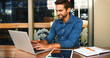 © peopleimages.com - Laptop, man and freelancer typing in cafe for article, update review or journalist check email. Computer, remote work and happy customer in coffee shop to research news, report and editing headline