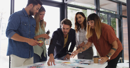 Poster - Office, business people and teamwork with talking for color swatch, creative agency and decision. Boardroom, women or men as graphic designer with palette for brainstorming, company branding or point