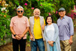 © StockImageFactory - Joyful elderly Indian friends standing together outdoors, radiating happiness and warm expressions
