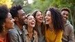 © Petro - A diverse group of joyful friends sharing laughter in a sunlit park, showcasing a moment of genuine happiness.