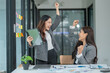 © panomporn - Asian woman succeeds at office