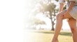 © NN AI - Woman touching leg outdoors sunny day park nature background. Female hand on skin summer dress natural light. Pain injury healthcare medical concept. Leg care treatment horizontal banner