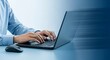 © Armin - Close up of a man typing on a laptop computer with a mouse on the desk in office