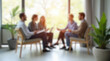 © Dmytriy - Blurred image of a group of people interacting in a bright office with large windows