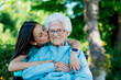 © ADDICTIVE STOCK - Elderly woman receiving affection in a wheelchair