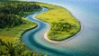 © Eduardo - Serpentine river winding through a lush landscape.