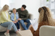© New Africa - Family having consultation with psychologist in office, selective focus