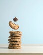 © nana - food stylists on which one round biscuit is vertically standing and perfectly balancing