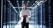 © Andrey Popov - Smiling IT Specialist Configuring Servers In Data Center