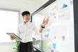 © Chanakon - Asian business people team analyzing statistics financial. Group Team of ceo business man and woman Meeting Conference Discussion various topic. Executive professional managers Corporate in office.