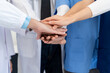© Kritdanai - Medical Teamwork Hands Together