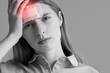 © Pixel-Shot - Young woman with brain concussion feeling headache on grey background