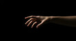 © Zulharyono - Hand Reaching Out in Low Light