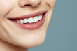 © MariAnnaCreative - Woman smiling with natural teeth close-up