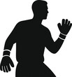 © SmartDesignStock - A silhouette of a goalkeeper with gloves ready to catch a ball in a defensive stance position look