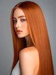 © Irina - with well-groomed fiery red hairstyle on plain background. Woman with straight hair for design