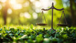 © MohammadImran - Symbolizing environmental law Justice scales nestled among lush green plants represent balance in nature in a blurred
