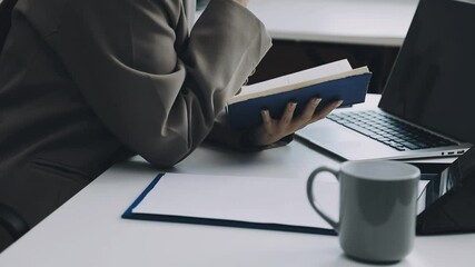 Two asian team working development of programming and encryption technology website design programmers on desk in office