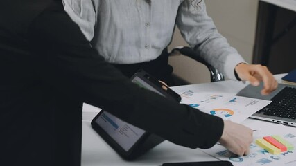 Two asian team working development of programming and encryption technology website design programmers on desk in office