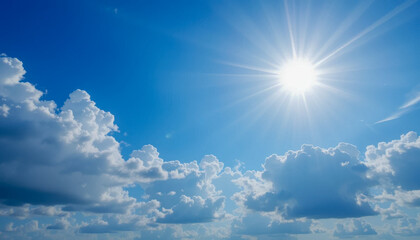 Wall Mural - A vibrant summer sky showcases a radiant sun, its rays piercing through fluffy cumulus clouds. The deep blue canvas contrasts beautifully with the bright white clouds and the sun's intense light.