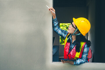 Wall Mural - Construction supervisor reviews project information and data to ensure proper compliance with plan.