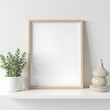 © Erik - Mockup Frame with Potted Plant and Decorative Object on Shelf