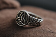 © Kim - Silver ring gleams, showing Celtic knot mystic beauty