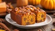 © Chaweewan - Individual serving slices of pumpkin bread on white ceramic plate