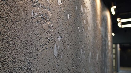 Poster - Exploring textured cement wall surfaces in a modern urban environment